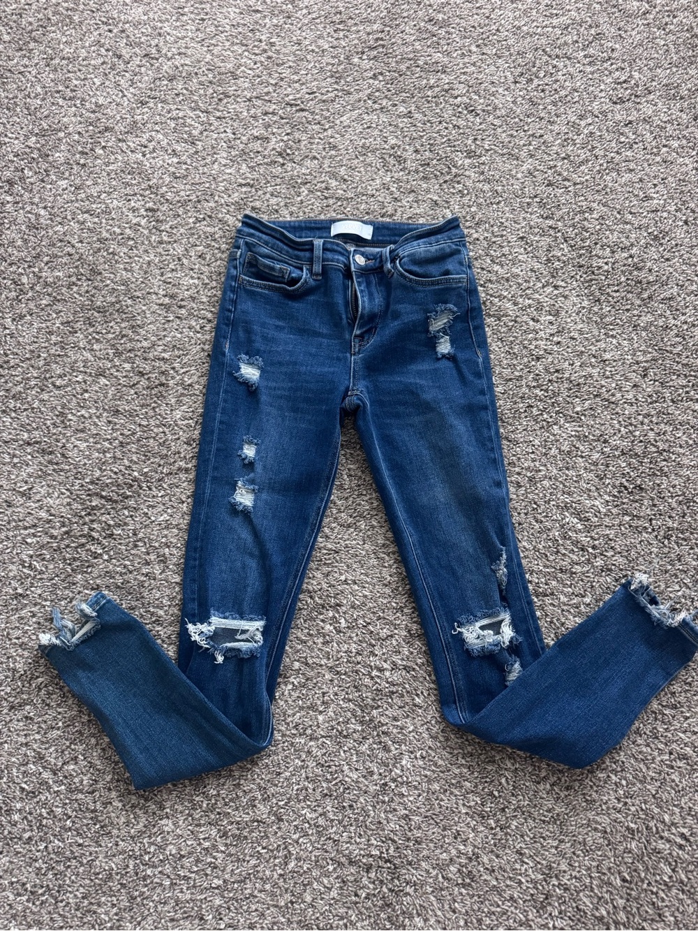 Women’s Dark Indigo Ripped Skinny Jeans